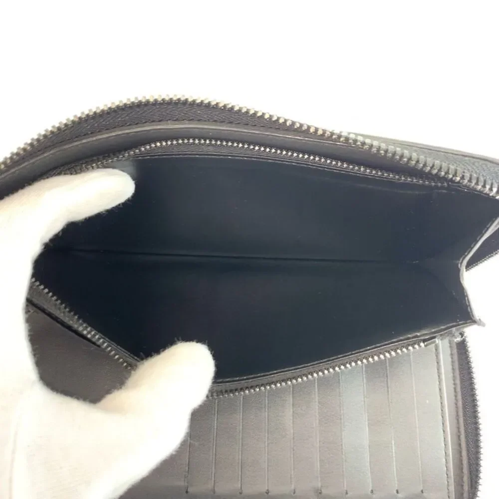 Louis Vuitton Zippy Vertical Monogram Shadow